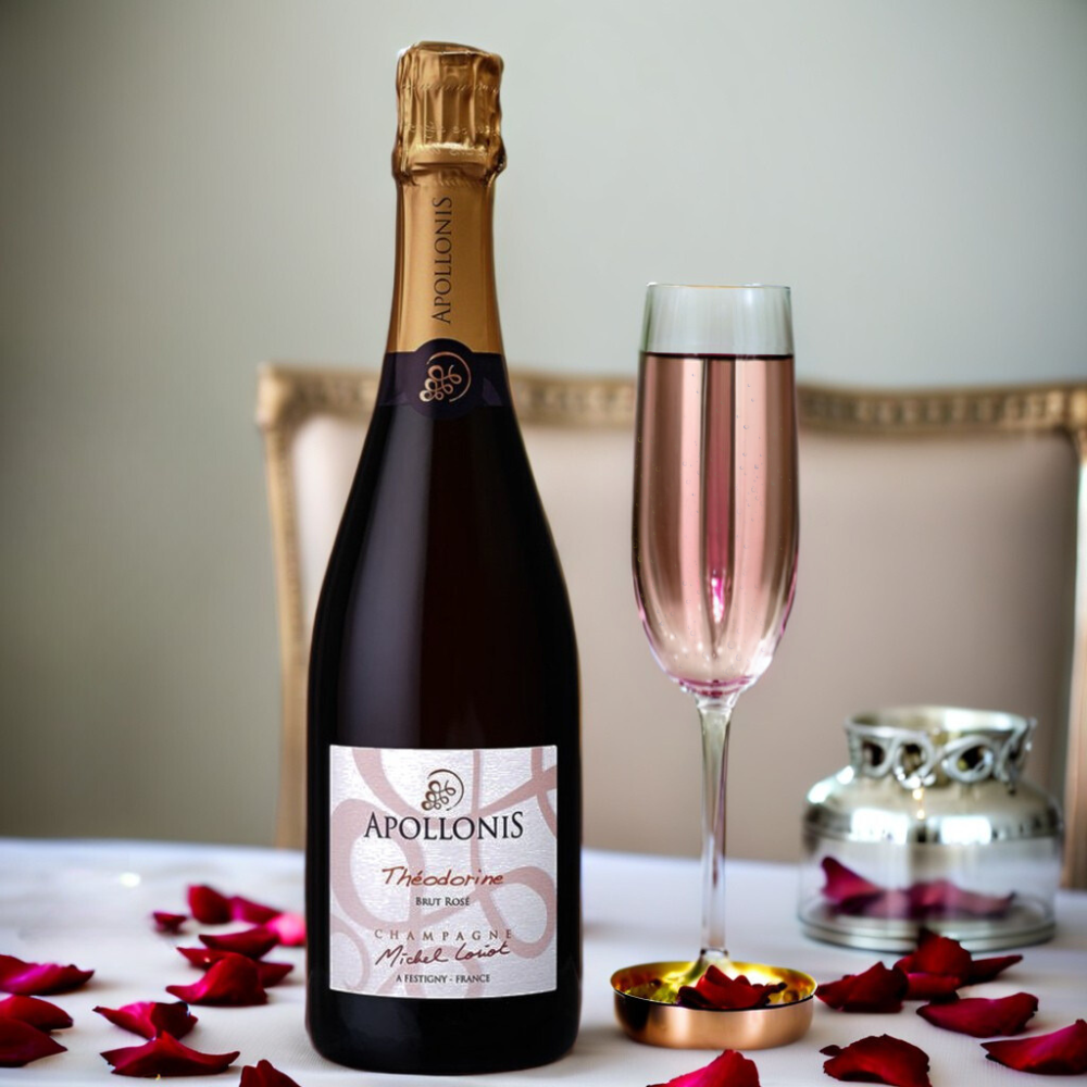 A bottle and a filled glass of Apollonis Theodorine Brut Rosé Champagne